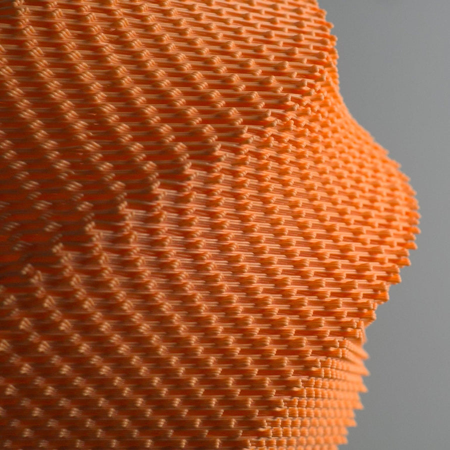 Wave Lampenschirm Orange im Detail: fein gerippte, gedrehte Oberfläche, handgefertigt in Heidelberg